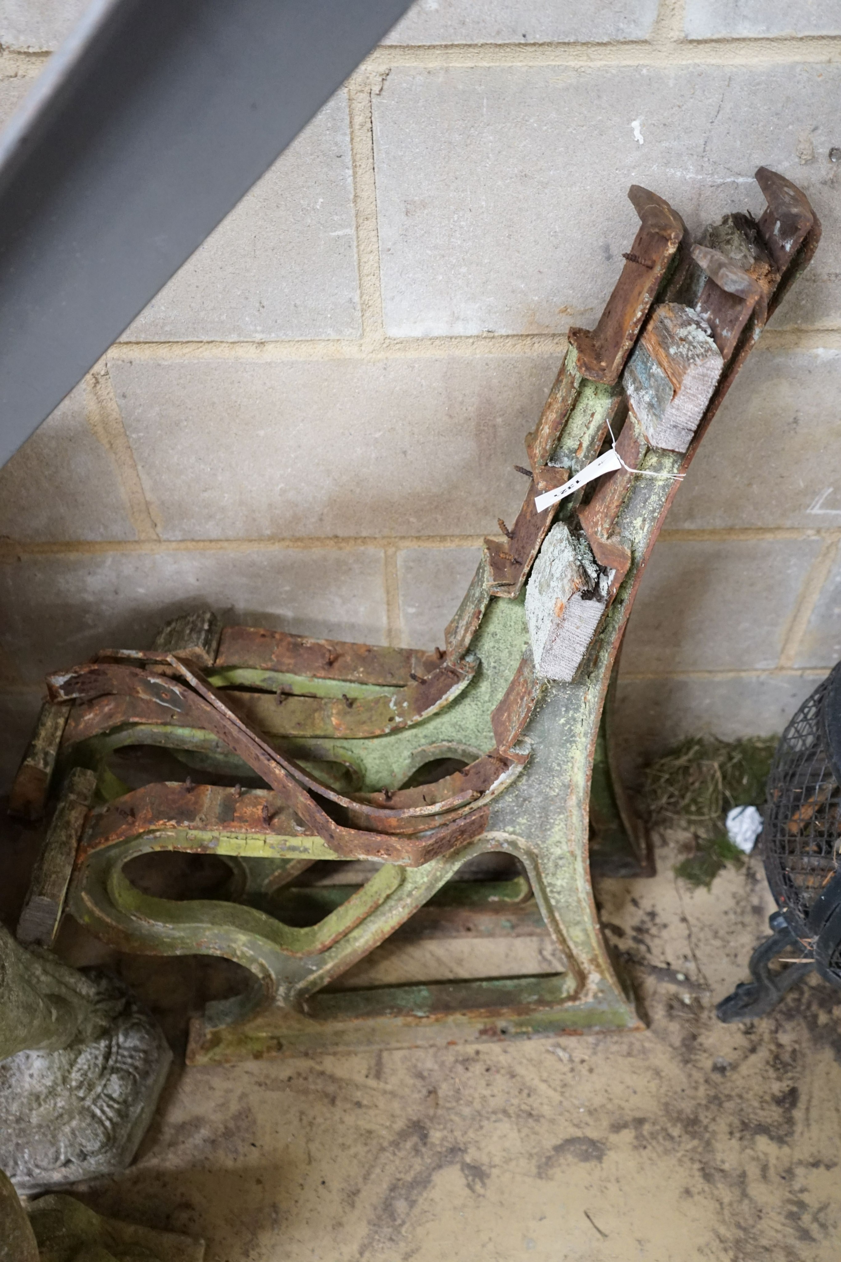 An early 20th century cast iron three section bench frame, probably marine or municipal, height 85cm